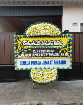 Papan Bunga Duka di Tahuna Barat